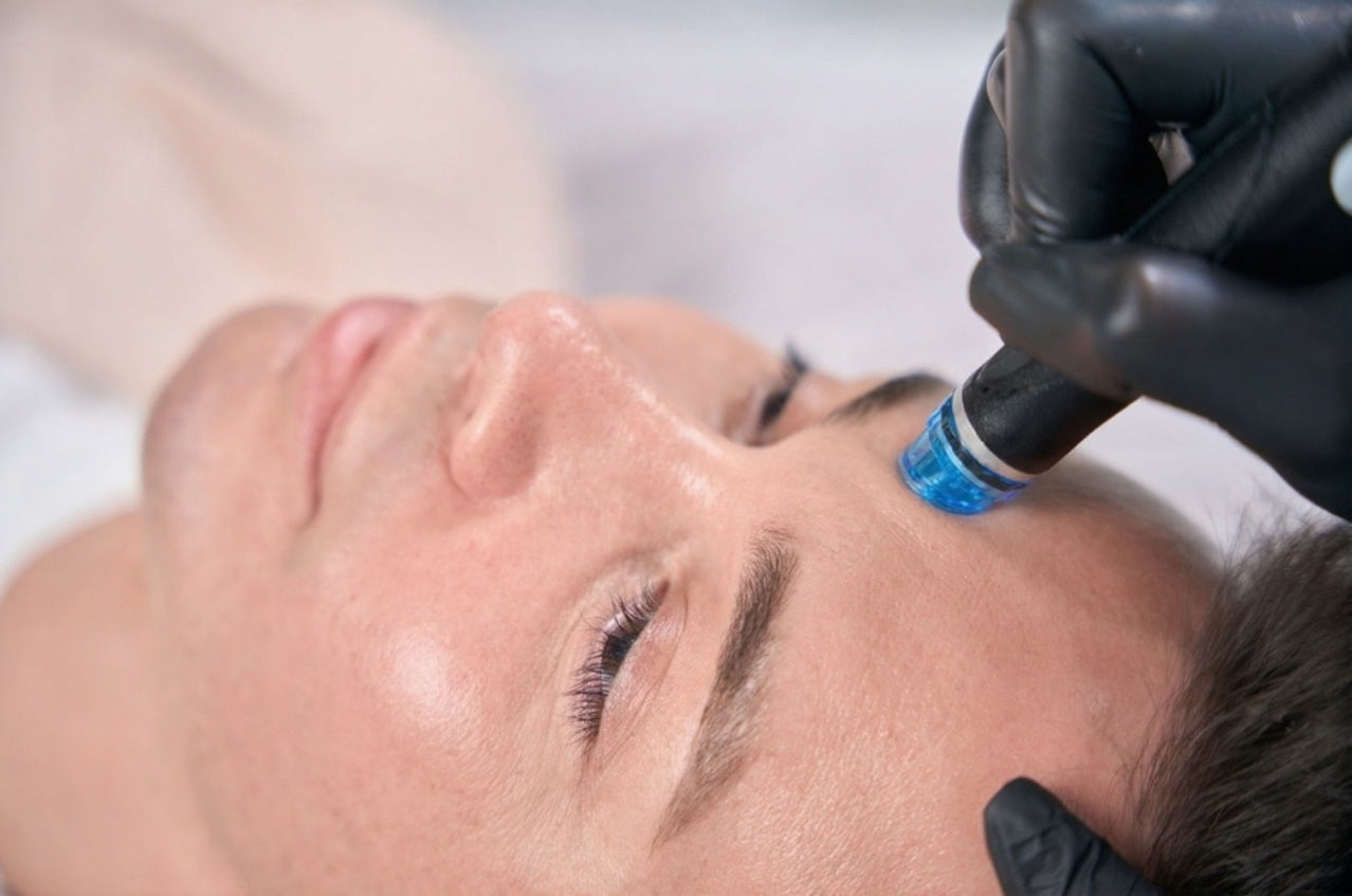 sleek professional beauty machine on clean clinic counter with cool lighting